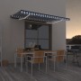 Tenda da Sole Retrattile Manuale con LED 450x350 cm Blu Bianca