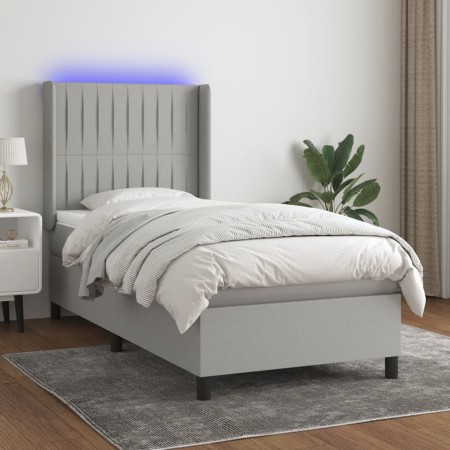 Letto a Molle Materasso e LED Grigio Chiaro 90x190 cm Tessuto